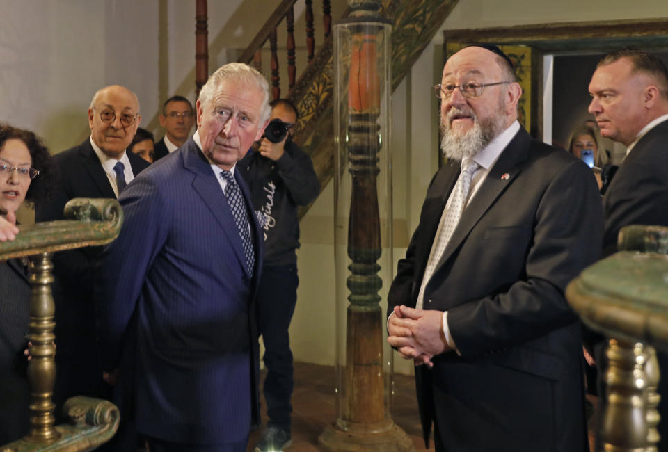 FILE - Britain's Prince Charles and Rabbi Ephraim Mirvis visit the 1736 Suriname reconstructed Tzedek ve-Shalom Synagogue at the Israel Museum in Jerusalem, Jan. 23, 2020. Britain’s Chief Rabbi Ephraim Mirvis, who received a knighthood, was among several Jewish community leaders to be recognized in this New Year’s Honors list on Friday, Dec. 30, 2022, the first to be signed off by Britain's King Charles III. (Menahem Kahana/Pool Photo via AP, file)