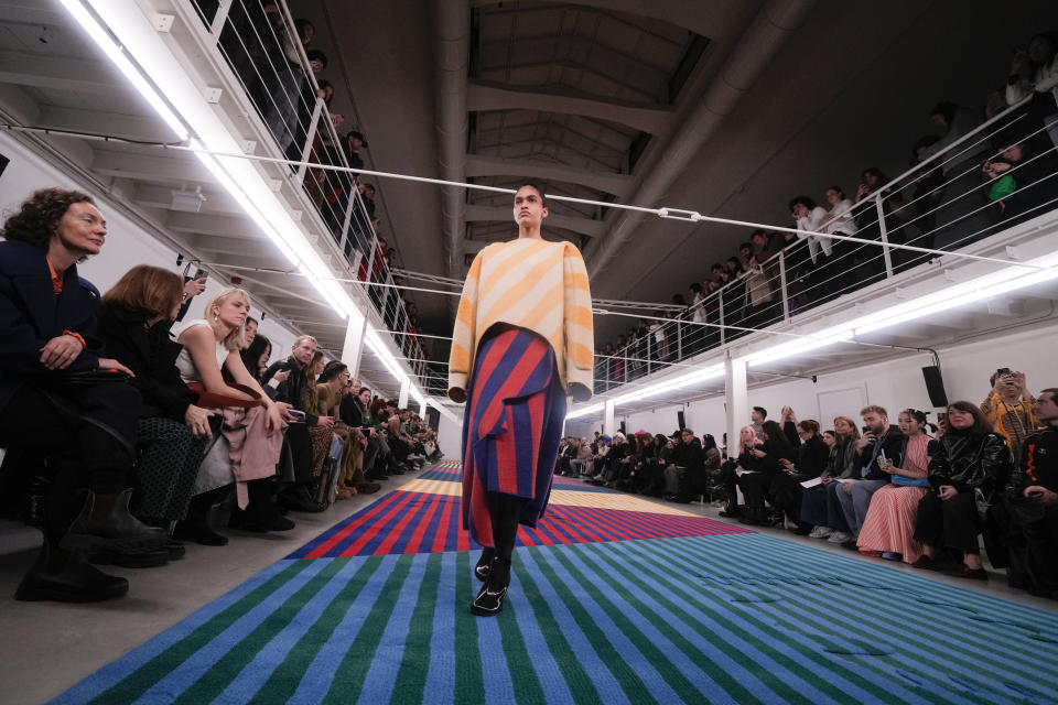 A model wears a creation as part of the Sunnei women's Fall-Winter 2024-25 collection presented in Milan, northern Italy, Friday, Feb. 23, 2024. (AP Photo/Luca Bruno)