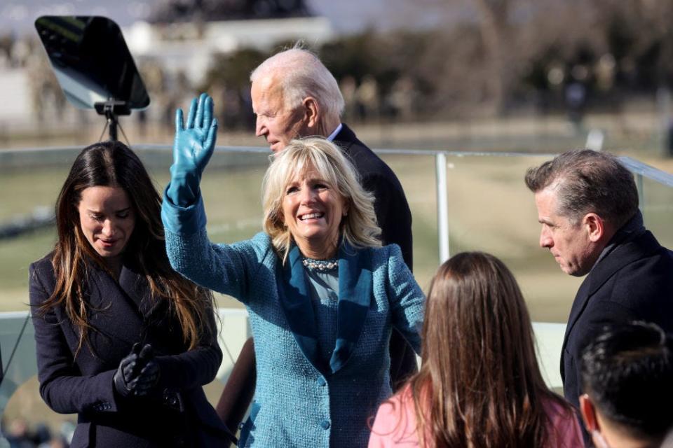 Jill Biden waves alongside grown Biden children Ashley and Hunter after husband Joe Biden was sworn in as president.