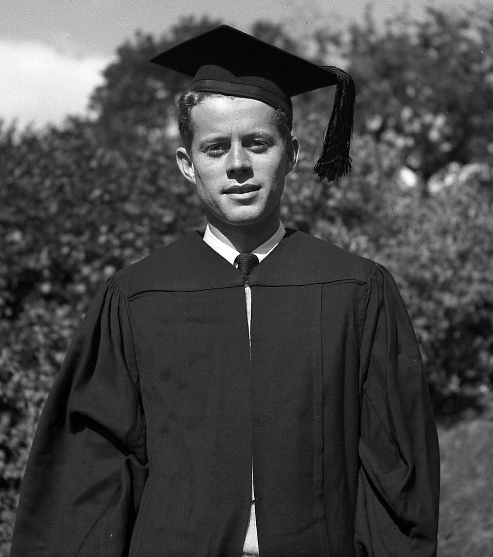 JFK wearing cap and gown