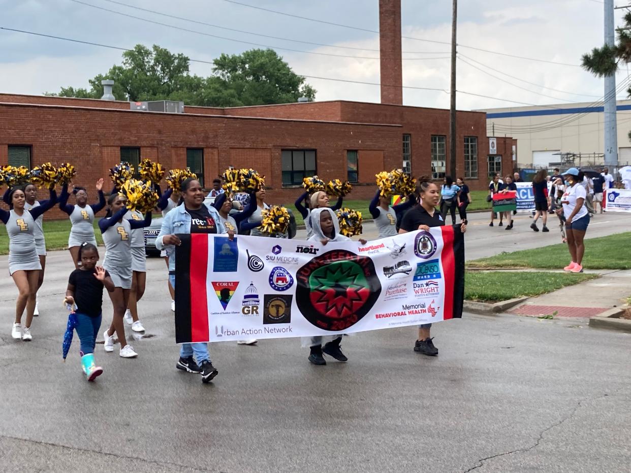 Leaders of the 2021 Springfield Juneteenth parade round the corner from Martin Luther King Jr. Drive to Adams Street as they prepare to enter Comer Cox Park on Saturday morning. This year, Juneteenth activities run from June 16 to June 19.