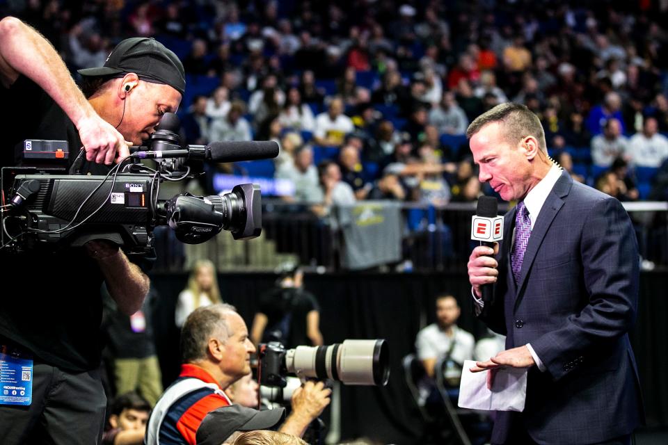 Quint Kessenich does a report on ESPN during the first session of the NCAA Division I Wrestling Championships, Thursday, March 16, 2023, at BOK Center in Tulsa, Okla.