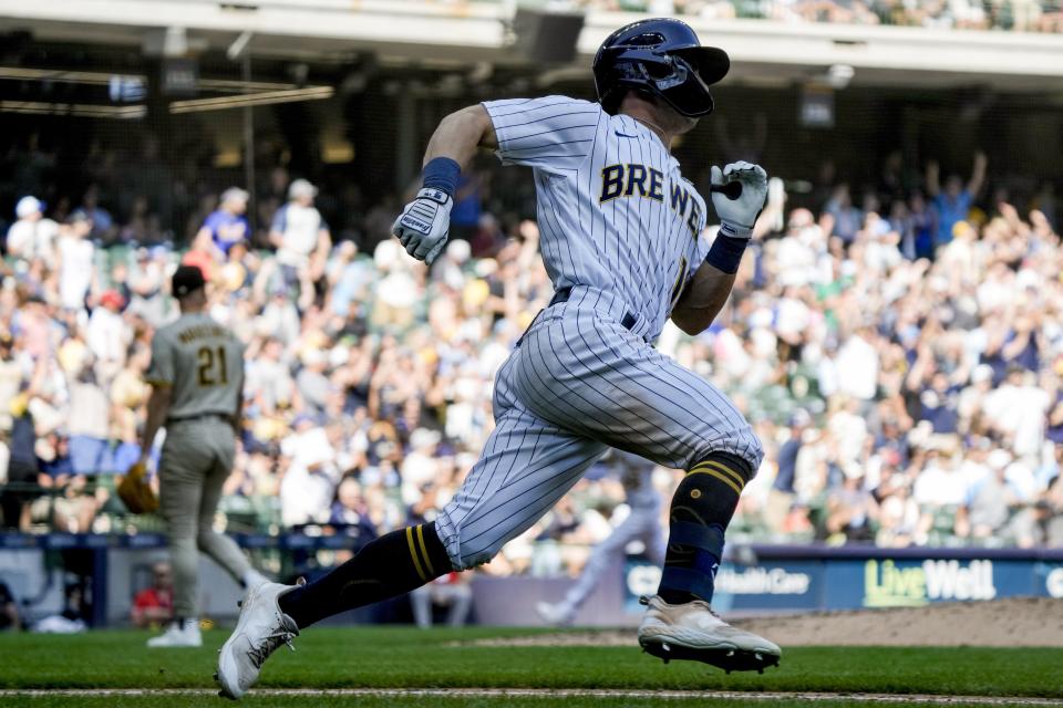 Milwaukee Brewers' Sal Frelick hits a two-run scoring double during the sixth inning of a baseball game against the San Diego Padres Sunday, Aug. 27, 2023, in Milwaukee. (AP Photo/Morry Gash)