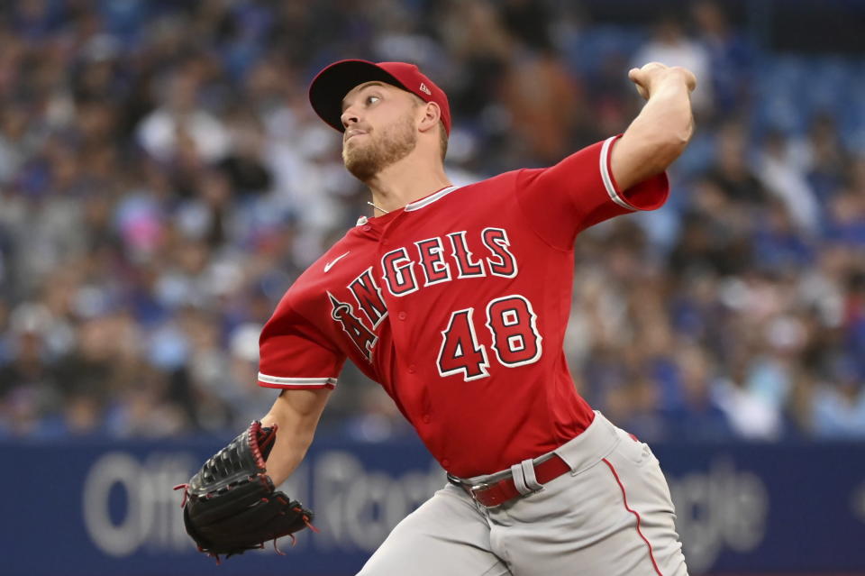 Los Angeles Angels starting pitcher Reid Detmers throws to a Toronto Blue Jays batter in the first inning of a baseball game in Toronto, Friday, Aug. 26, 2022. (Jon Blacker/The Canadian Press via AP)