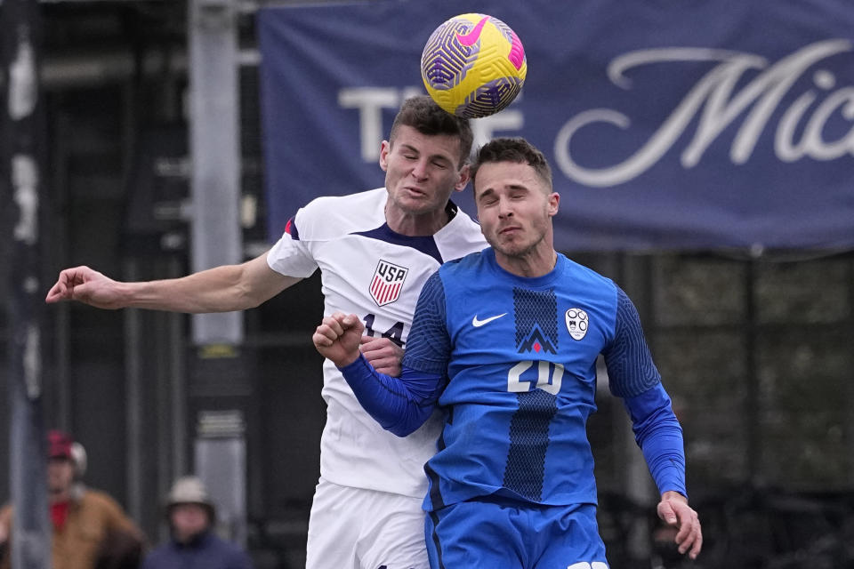 United States midfielder Sean Zawadzki (14) and Slovenia midfielderJan Repas battle for a head ball during the first half of an international friendly soccer match in San Antonio, Saturday, Jan. 20, 2024. (AP Photo/Eric Gay)