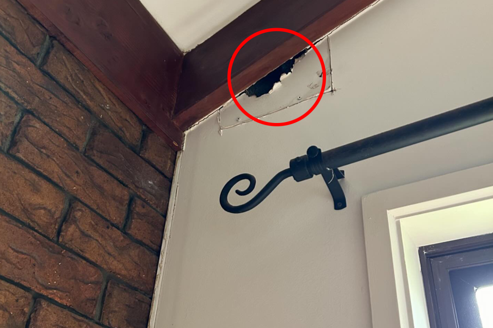 A red circle around a second hole in the wall at the Helensvale address.