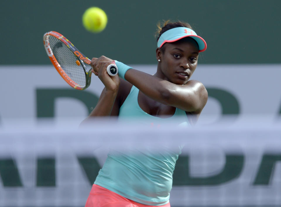 Sloane Stephens hits to Flavia Pennetta, of Italy, during a quarterfinal match at the BNP Paribas Open tennis tournament Thursday, March 13, 2014, in Indian Wells, Calif. (AP Photo/Mark J. Terrill)
