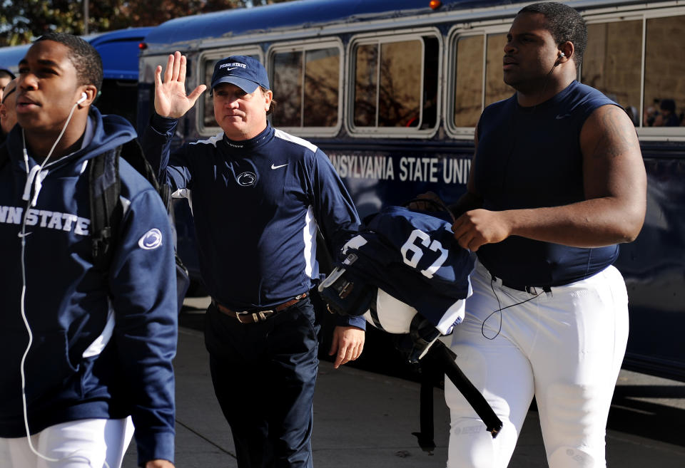 STATE COLLEGE, PA - NOVEMBER 12: Penn State coach Tom Bradley exits the team bus and enters the stadium before taking on Nebraska at Beaver Stadium on November 12, 2011 in State College, Pennsylvania. Head football coach Joe Paterno was fired amid allegations that former Penn State defensive coordinator Jerry Sandusky was involved with child sex abuse. Penn State is playing their final home football game against Nebraska. (Photo by Patrick Smith/Getty Images)