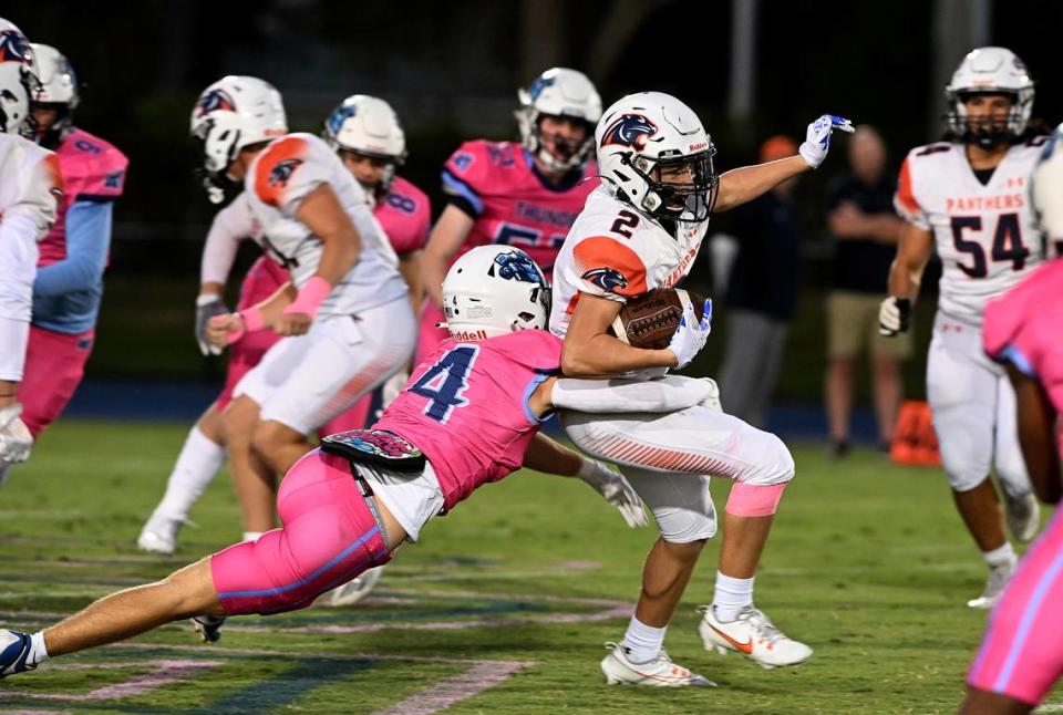 BCS’ Colton Dempsey runs the ball as ODA’s Jack Meyers tries to halt him at the Out of Door Academy field on Friday, Oct. 20, 2023. Tiffany Tompkins/ttompkins@bradenton.com