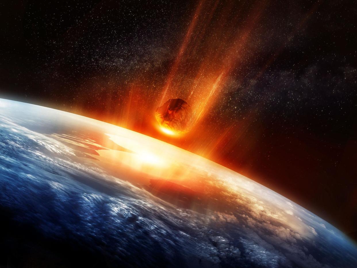 A large Meteor burning and glowing as it hits the earth's atmosphere: Getty Images/iStockphoto