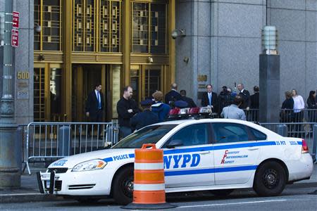 An NYPD car is seen outside Manhattan's federal court where Nazih al-Ragye, known by the alias Abu Anas al-Liby, is expected for arraignment in New York, October 15, 2013. REUTERS/Eduardo Munoz