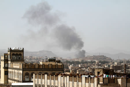 Smoke rises after an airstrike in Sanaa, Yemen March 22, 2018. REUTERS/Mohamed al-Sayaghi