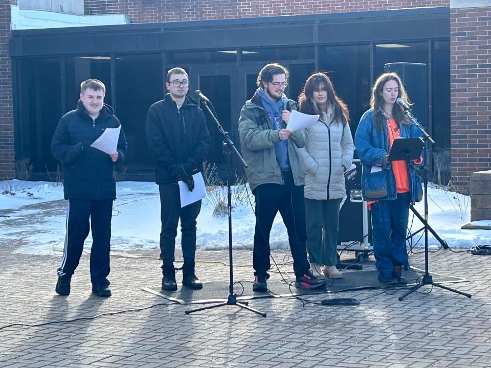 The LSSU student poetry group recites poems about spring to the crowd during the annual Snowman Burning at LSSU on March, 21, 2024.