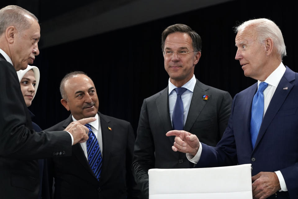 From left, Turkish President Recep Tayyip Erdogan, Turkish Foreign Minister Mevlut Cavusoglu, Netherland's Prime Minister Mark Rutte and U.S. President Joe Biden during a round table meeting at a NATO summit in Madrid, Spain on Wednesday, June 29, 2022. North Atlantic Treaty Organization heads of state and government will meet for a NATO summit in Madrid from Tuesday through Thursday. (AP Photo/Susan Walsh, Pool)