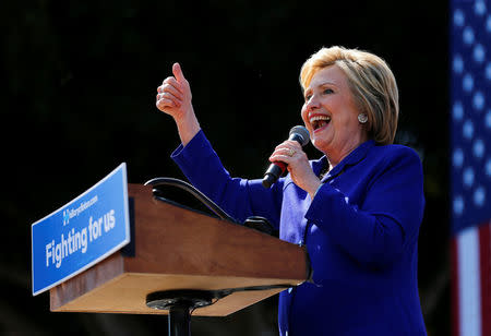 U.S. Democratic presidential candidate Hillary Clinton gives a thumbs-up during a campaign stop and speech in Los Angeles, California, United States June 6, 2016. REUTERS/Mike Blake.