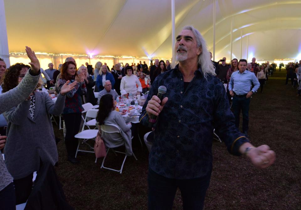 Guy Penrod, Grammy and Dove Award Artist, walks through the crowd singing while entertaining the approximately 1,500 attendees at the 18th annual Vero Beach Prayer Breakfast on Tuesday, Feb. 15, 2022, at Riverside Park.