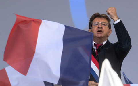 Far-left opposition "France Insoumise" (France Unbowed) party's leader Jean-Luc Melenchon delivers a speech at the end of a demonstration against the government's labour reforms in Paris, France, September 23 - Credit: REUTERS
