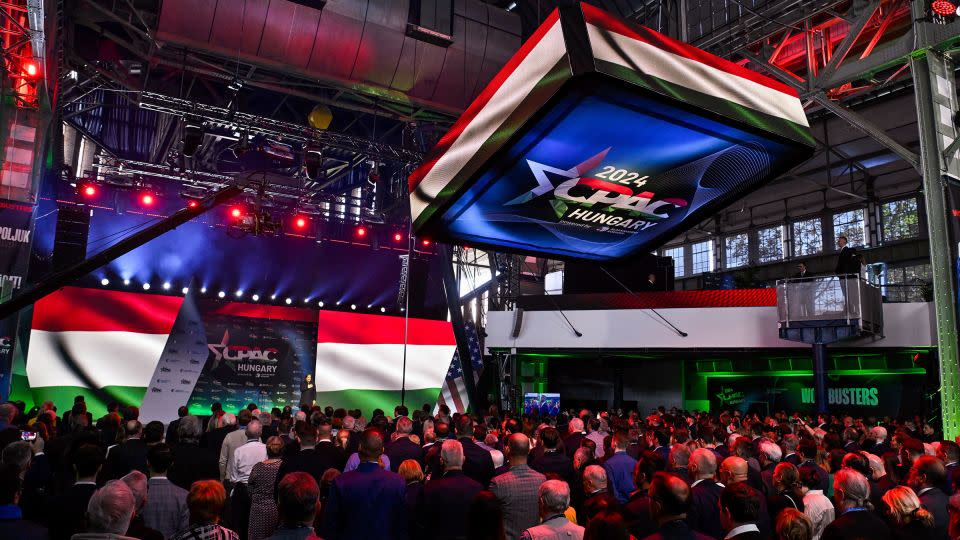 Participants sing the national anthem during the opening ceremony for the third Hungarian edition of the Conservative Political Action Conference in Budapest. - Szilard Koszticsak/MTI/AP