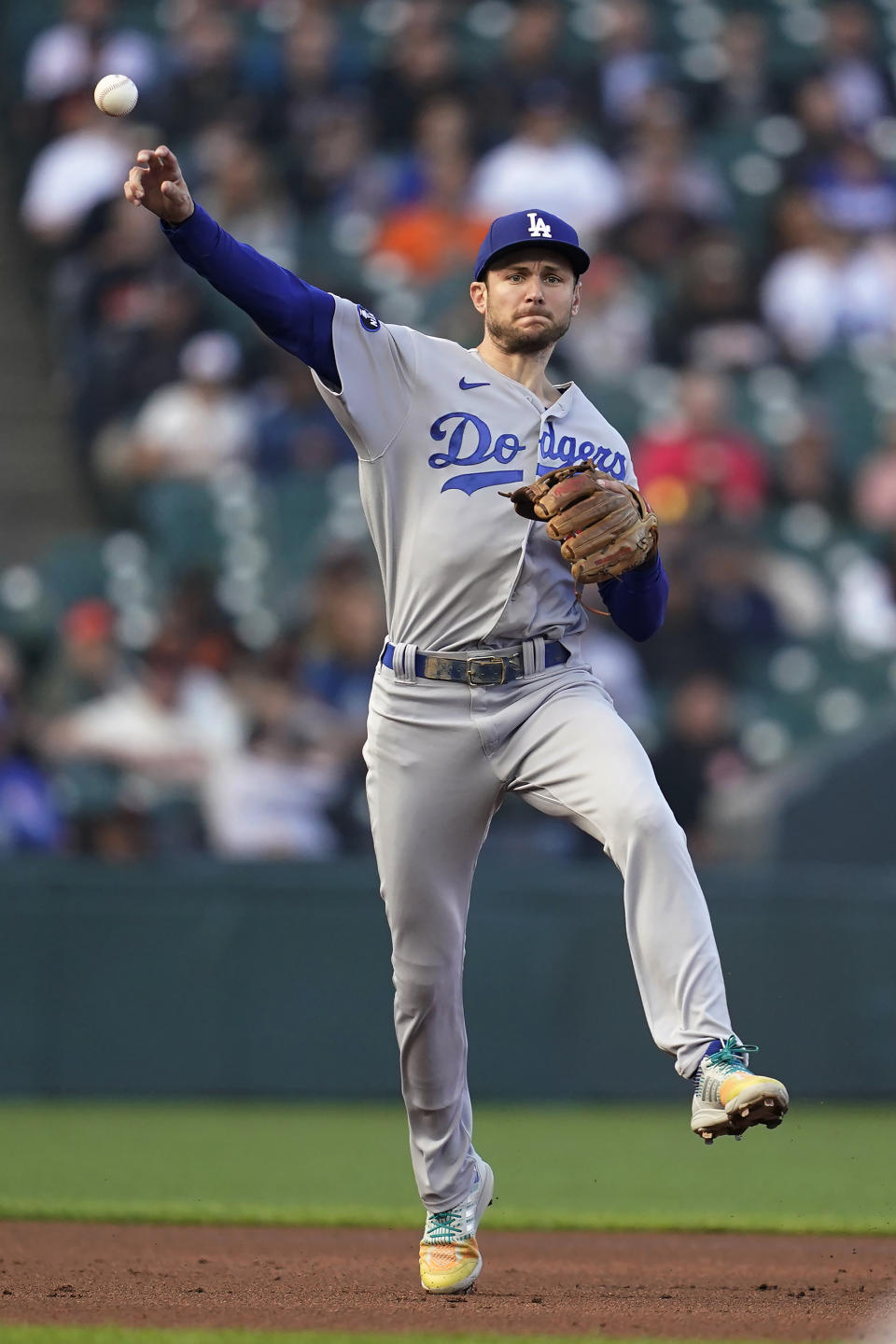Los Angeles Dodgers shortstop Trea Turner throws out San Francisco Giants' Austin Slater at first base during the first inning of a baseball game in San Francisco, Wednesday, Aug. 3, 2022. (AP Photo/Jeff Chiu)