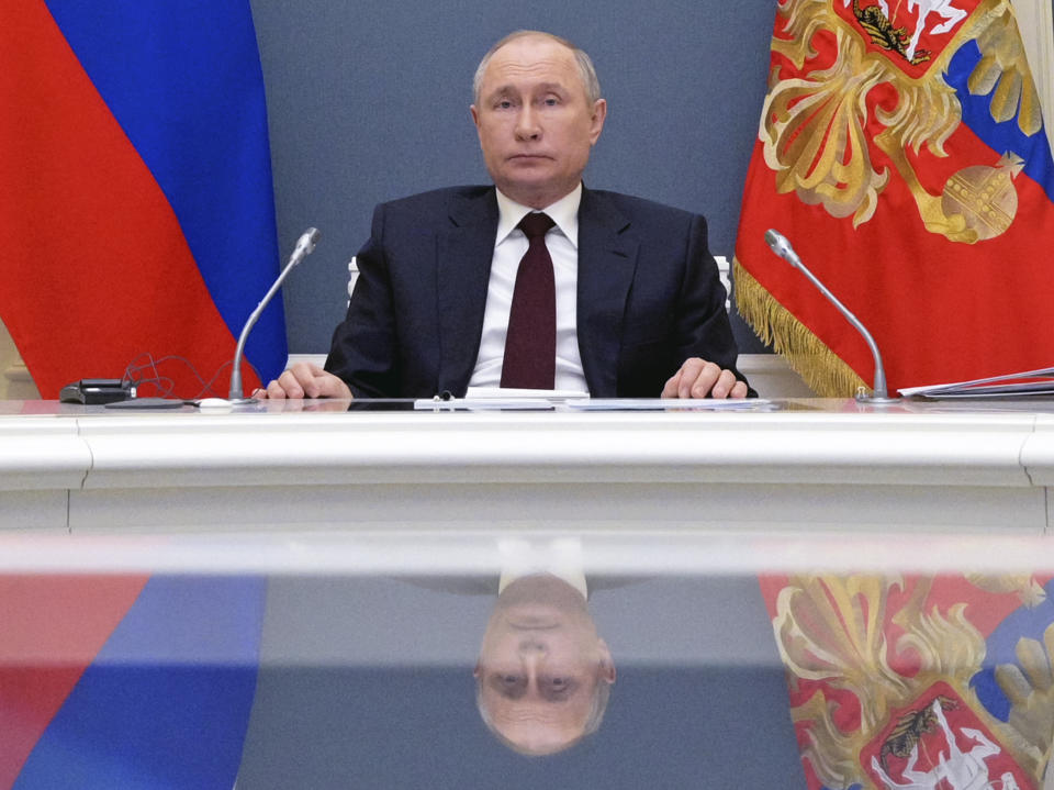 Russian President Vladimir Putin attends the virtual Leaders Summit on Climate in Moscow, Russia, Thursday, April 22, 2021. (Alexei Druzhinin, Sputnik, Kremlin Pool Photo via AP)