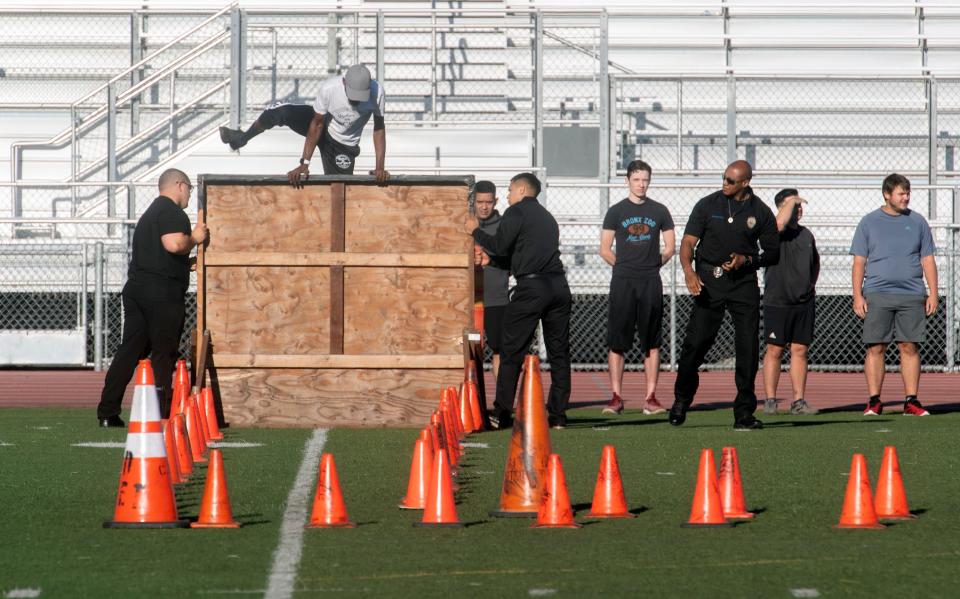 The Stockton Police Department holds its recruit testing, which consisted of a obstacle course, half-mile run and written test, at the Stagg High School football field in Stockton on Aug. 13, 2022.