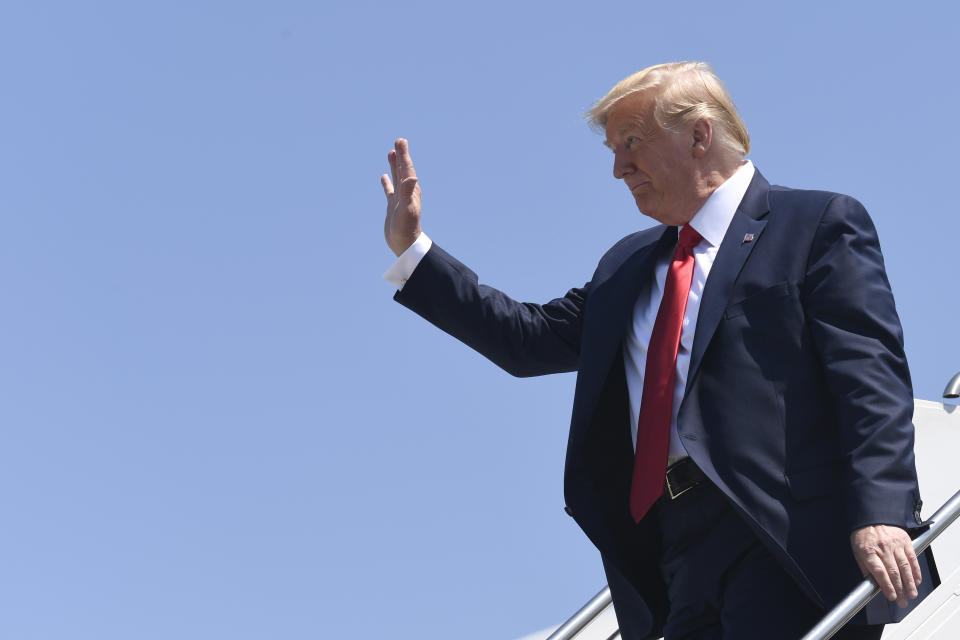 President Donald Trump walks down the steps of Air Force One at Francis S. Gabreski Airport in Westhampton Beach, N.Y., Friday, Aug. 9, 2019. Trump is in the Hamptons to attend a pair of fundraisers before heading to his golf club in New Jersey for vacation. (AP Photo/Susan Walsh)