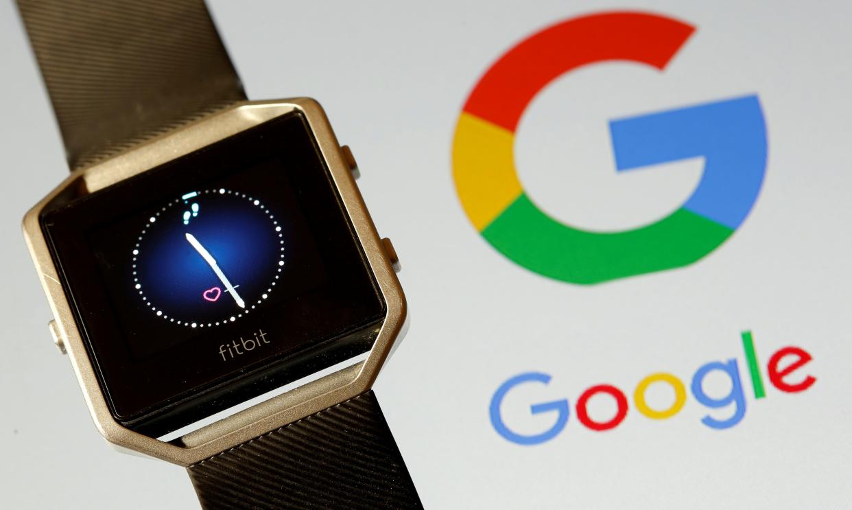 FILE PHOTO: Fitbit Blaze watch is seen in front of a displayed Google logo in this illustration picture taken, November 8, 2019. REUTERS/Dado Ruvic/File Photo