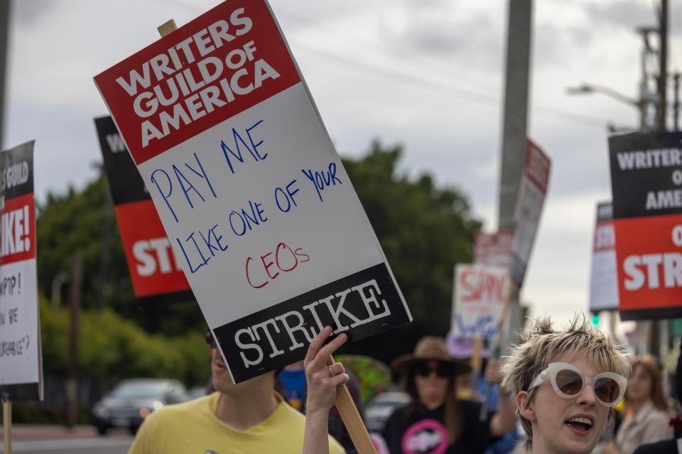 People picket outside of Paramount Pictures studios during the Hollywood writers strike on May 4, 2023 in Los Angeles, California.