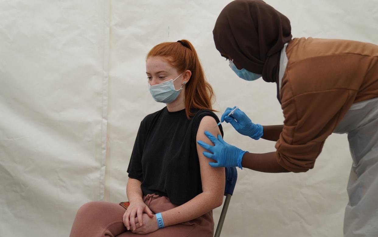 Ministers are in talks with dozens of companies, including coffee and cinema chains, to give vouchers to young people who have a coronavirus vaccination