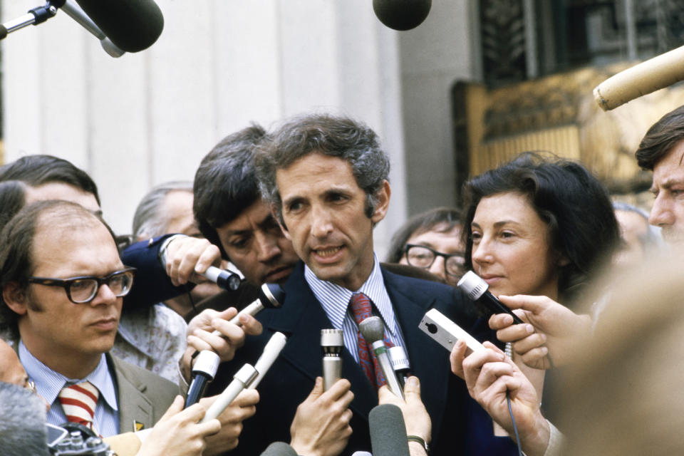 American researcher Tony Russo (1936-2008) and American economist and political activist Daniel Ellsberg address the media during a recess in their trial at the Federal Courtroom in Los Angeles, California, 10th May 1973. Russo and Ellsberg stand accused of illegally copying and distributing the Pentagon papers relating to the Vietnam war; it emerged during the trial that the FBI put a wiretap on Ellsberg's telephone conversations in 1969 and 1970. (Bettmann Archive / Getty Images file)
