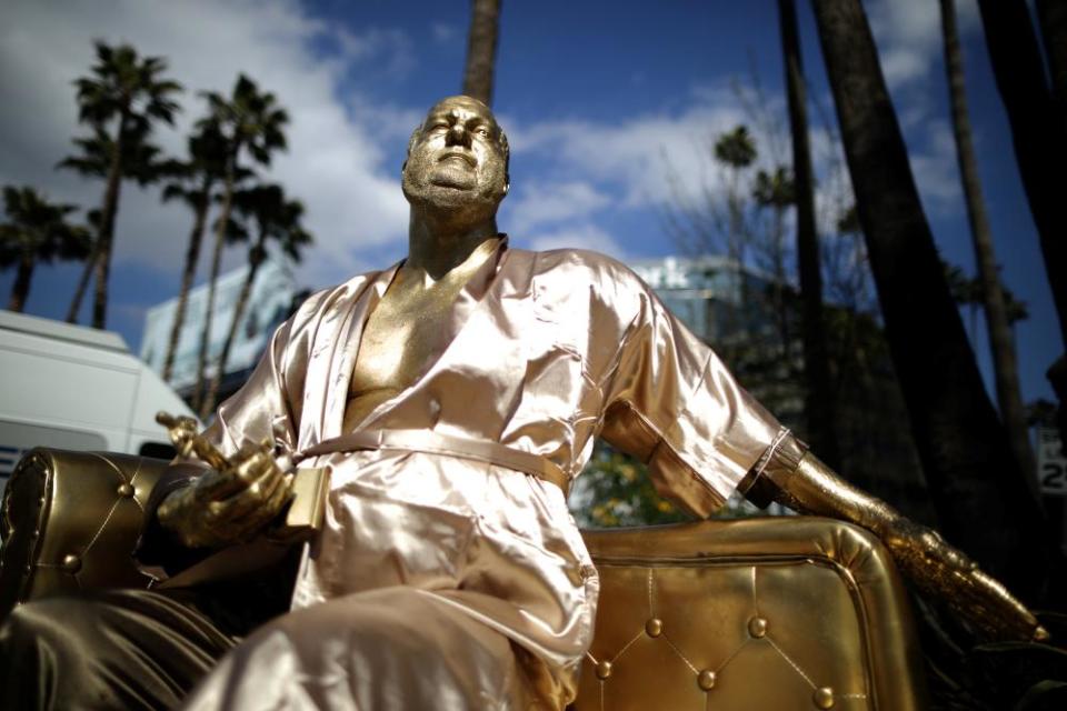 A statue of Harvey Weinstein on a casting couch made by artist Plastic Jesus on Hollywood Boulevard.