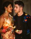 <p>The couple shared a beautiful photo of themselves celebrating the festival of Diwali, while staying in London. </p><p><a href="https://www.instagram.com/p/CHlUNa2jgan/" rel="nofollow noopener" target="_blank" data-ylk="slk:See the original post on Instagram;elm:context_link;itc:0;sec:content-canvas" class="link ">See the original post on Instagram</a></p>