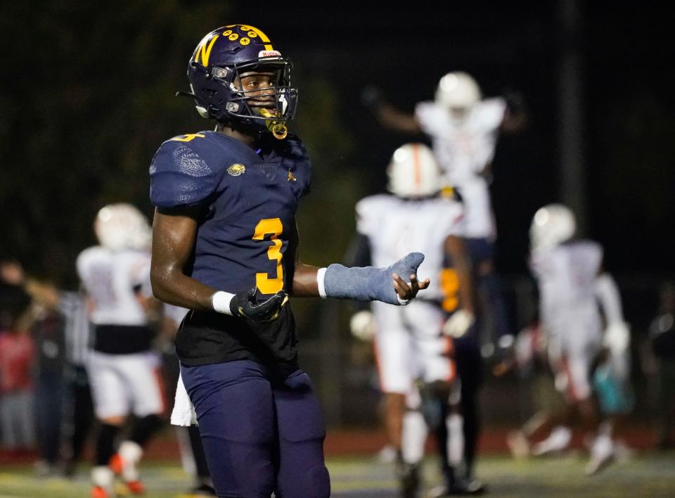 Naples Golden Eagles defensive back Kensley Faustin (3) reacts after the Dunbar Tigers score a touchdown during the first half of the Class 3S regional 4 final at Staver Field in Naples on Friday, Nov. 25, 2022. The Eagles fell 14-7 to the Tigers.