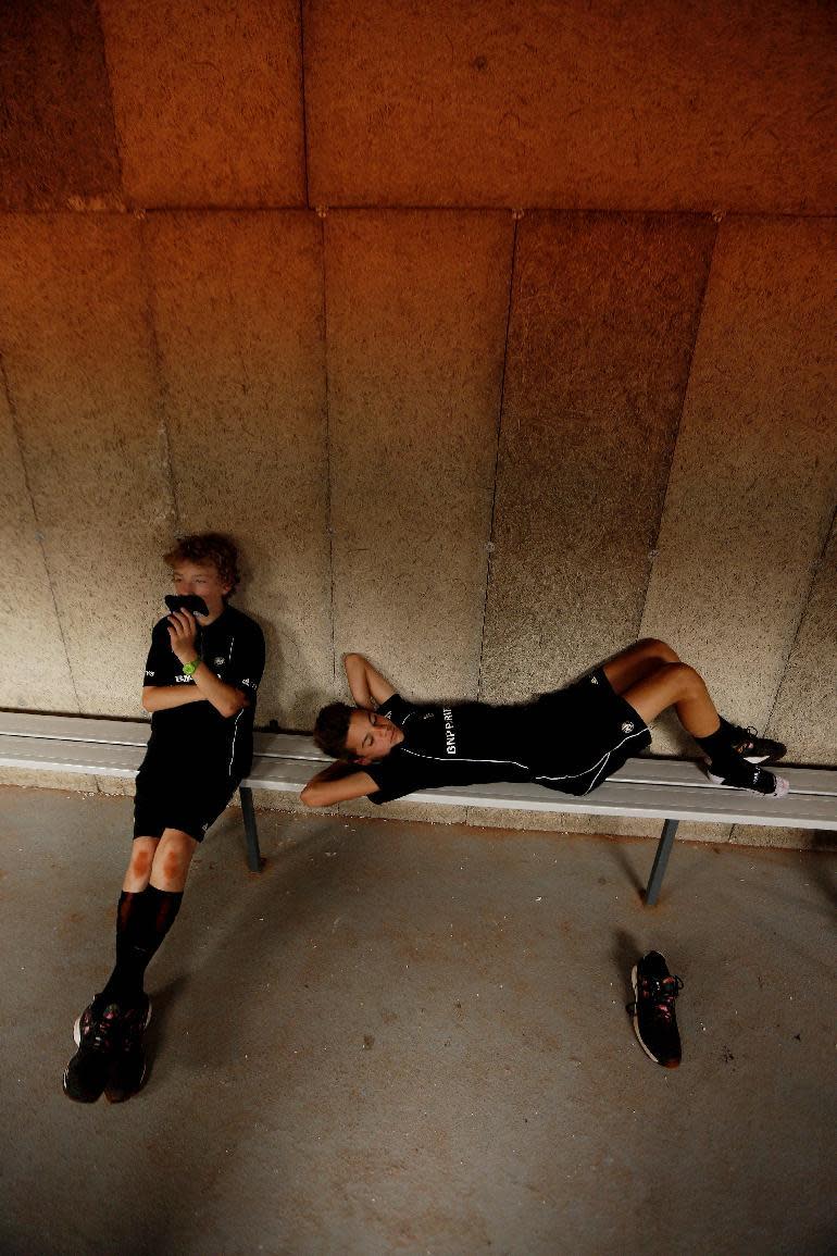 Tennis - French Open - Roland Garros, Paris, France - 2/6/15 General view of ball boys resting during the quarter finals Action Images via Reuters / Jason Cairnduff Livepic