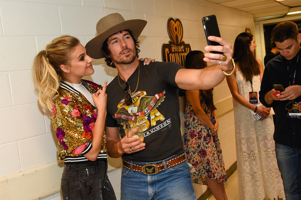 <p>Kelsea Ballerini and Mark Wystrach (Midland) attends the 2017 iHeartCountry Festival, A Music Experience by AT&T at The Frank Erwin Center on May 6, 2017 in Austin, Texas. (Photo: Rick Kern) </p>