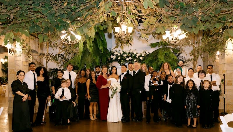 Greg and Holly Richardson and most of her family at the marriage celebration of her daughter, Nov. 17, 2023.