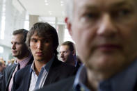 Washington Capitals' Alex Ovechkin, center, and Ottawa Senators' Jason Spezza, left, follow Donald Fehr, executive director of the NHL Players' Association, after talking to reporters following collective bargaining talks, Tuesday, Aug. 14, 2012, in Toronto. (AP Photo/The Canadian Press, Chris Young)