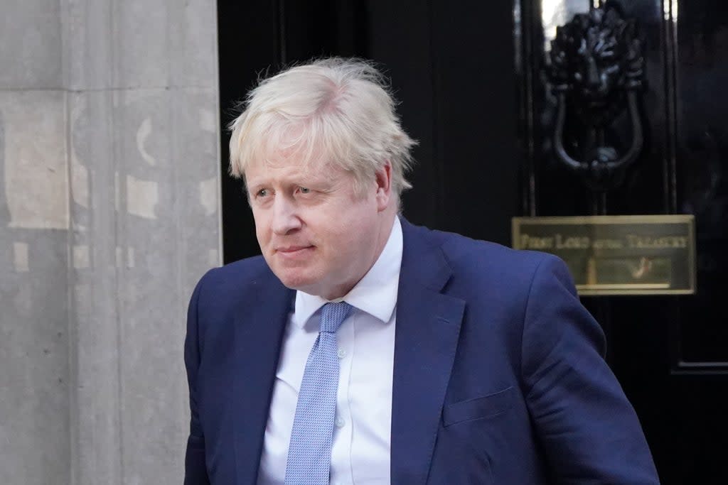 Prime Minister Boris Johnson leaves 10 Downing Street for the House of Commons, where he will make a statement to MPs on the Sue Gray report. (Jonathan Brady/PA) (PA Wire)