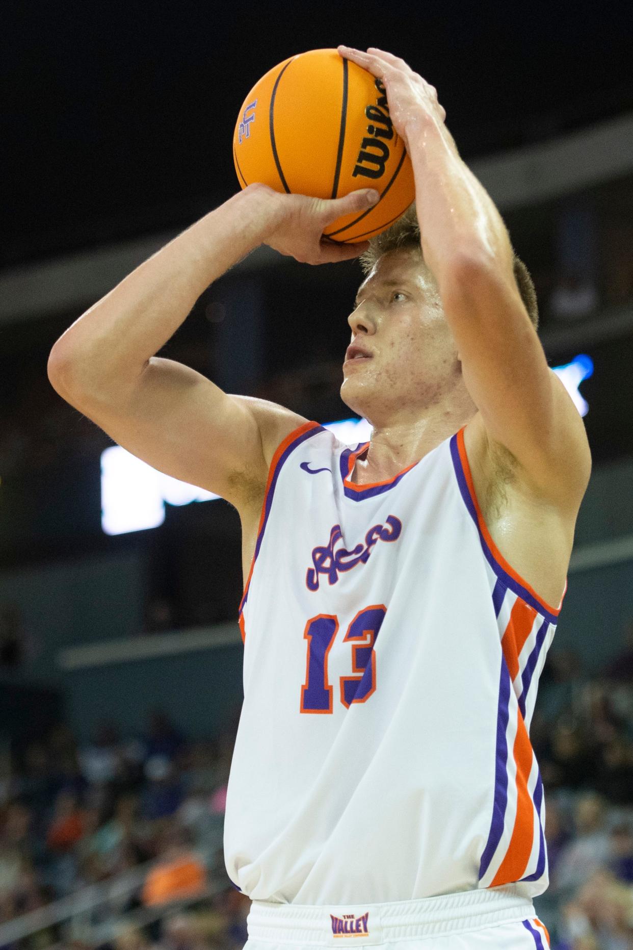 Evansville’s Ben Humrichous (13) eyes a shot as the University of Evansville Purple Aces play the Miami (Ohio) University Redhawks at Ford Center in Evansville, Ind., Monday, Nov. 6, 2023.