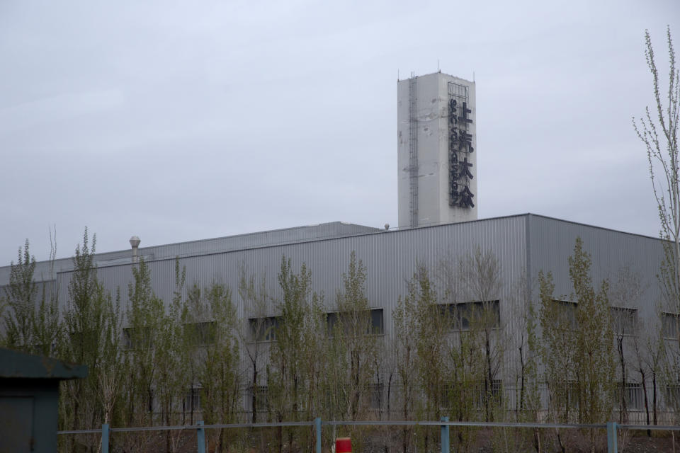 An SAIC Volkswagen plant is seen in the outskirts of Urumqi in northwestern China's Xinjiang Uyghur Autonomous Region, Thursday, April 22, 2021. An audit commissioned by Volkswagen has found no indication of forced labor at its plant in China's Xinjiang region, where Western governments have accused the Chinese government of human rights violations against the Uyghur ethnic minority, announced in a media briefing in Germany on Tuesday Dec. 5, 2023. (AP Photo/Mark Schiefelbein)