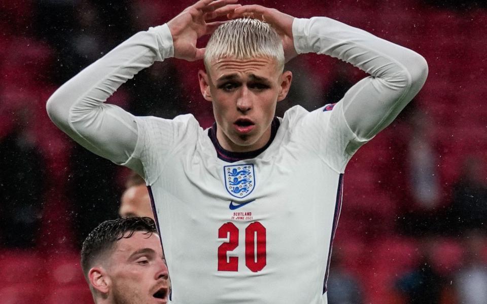 England's midfielder Phil Foden reacts during the UEFA EURO 2020 Group D football match between England and Scotland at Wembley - FRANK AUGSTEIN/POOL/AFP via Getty Images