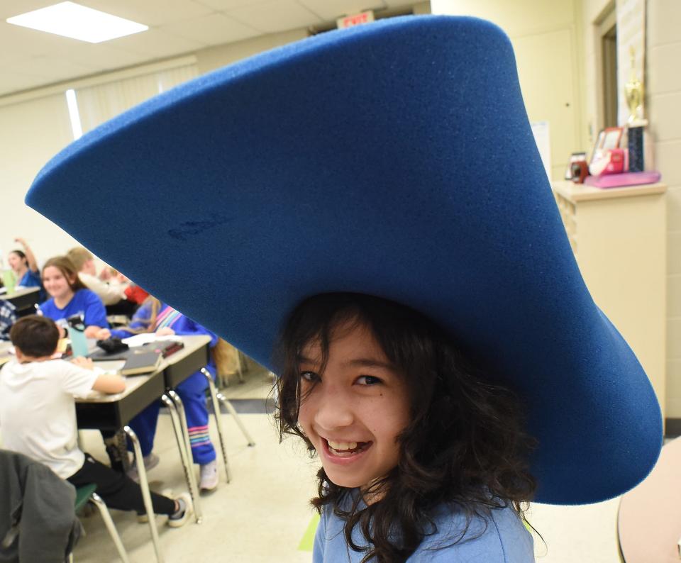 Barnes Elementary fifth grader Isabella Martinez wore a big blue hat in the spirit of the Detroit Lions Day Thursday at the school.