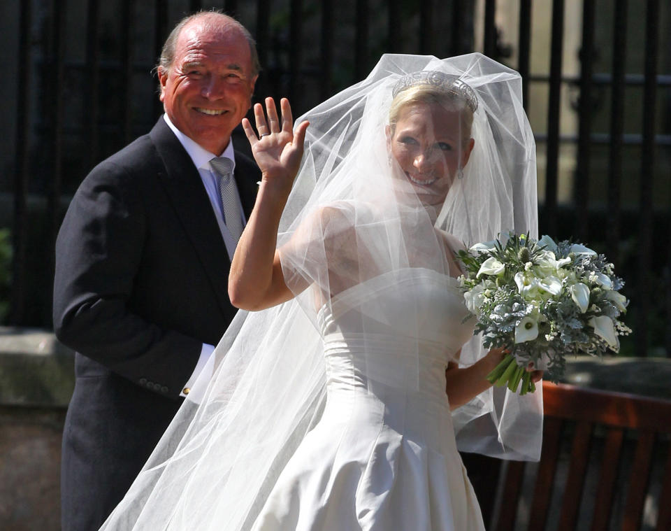 EDINBURGH, SCOTLAND - JULY 30:  Captain Mark Phillips and Zara Phillips arrive for the Royal wedding of Zara Phillips and Mike Tindall at Canongate Kirk on July 30, 2011 in Edinburgh, Scotland. The Queen's granddaughter Zara Phillips will marry England rugby player Mike Tindall today at Canongate Kirk. Many royals are expected to attend including the Duke and Duchess of Cambridge.  (Photo by Jeff J Mitchell/Getty Images)