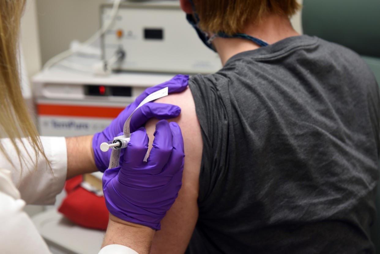 coronavirus vaccine trial injection shot patient covid 19