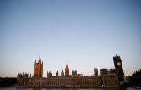 FILE PHOTO: The sun rises over the Houses of Parliament in London