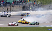 Joey Logano (22) spins out after hitting the wall in Turn 4 during a NASCAR Cup Series auto race at Kansas Speedway in Kansas City, Kan., Sunday, May 5, 2024. (AP Photo/Colin E. Braley)