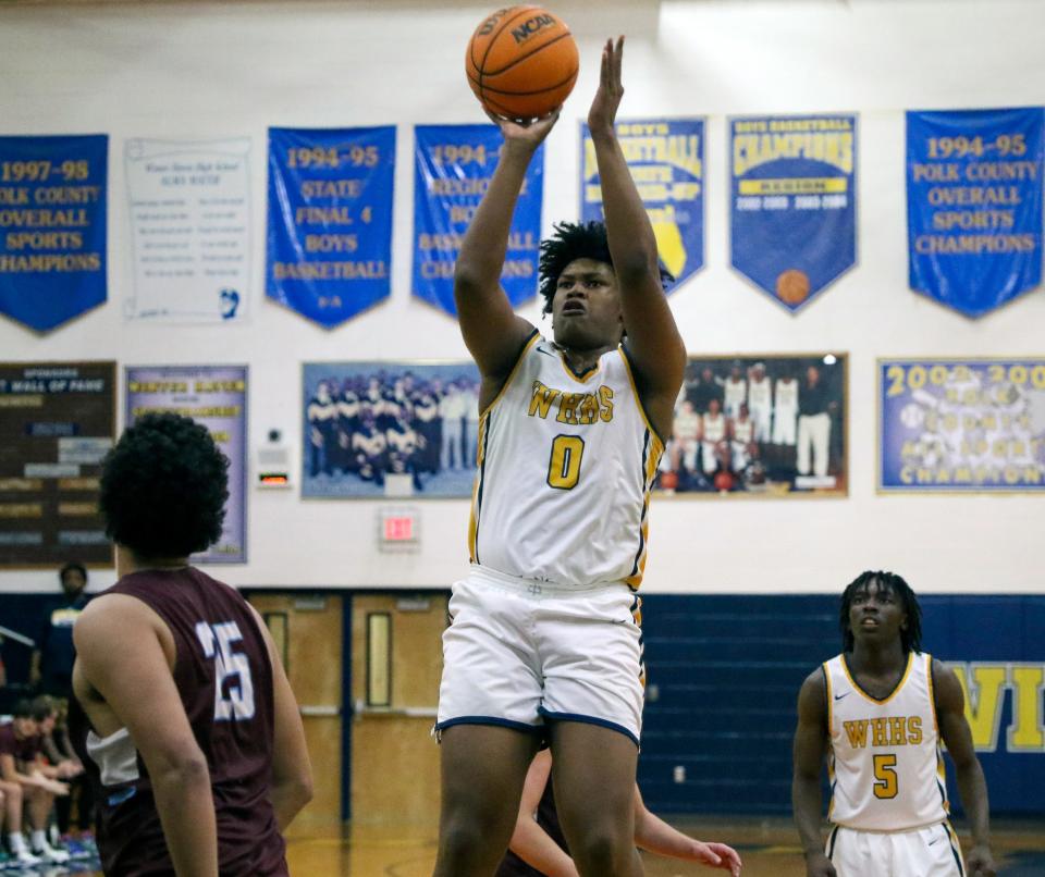 Winter Haven junior Jamie Phillips Jr. goes up for a shot against Sarasota Rivervew on Thurday night in the Class 7A, Region 3 quarterfinals at the Jack Deedrick Gymnasium.