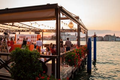 Aperol celebrates its 100th Birthday in Venice, bringing guests from around the world together to toast to the iconic orange aperitif 