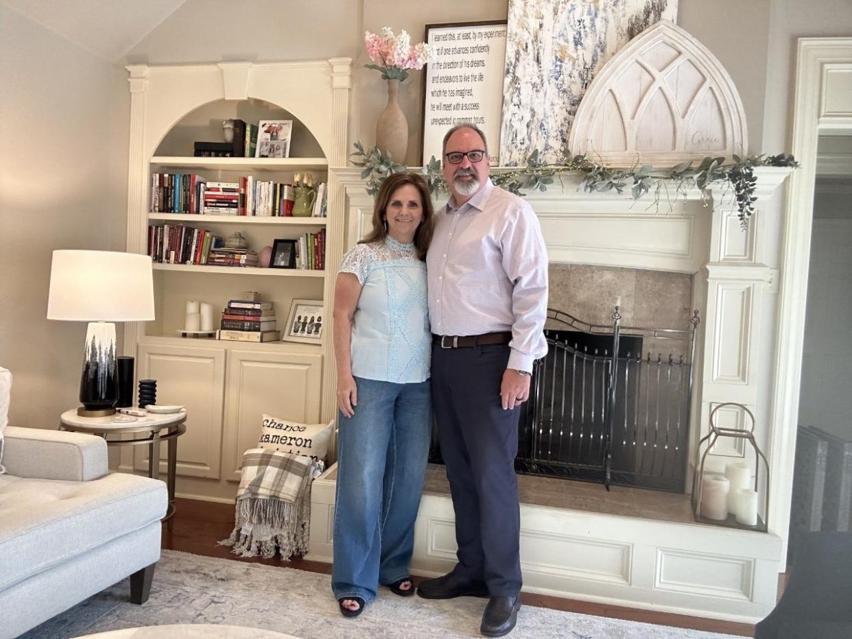 LIVING LARGER: Suzanne and Mark White, in their Cordova, Tenn., home, upsized their lifestyle after their kids left the nest.