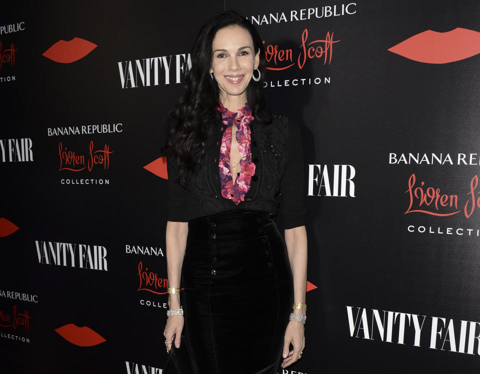 FILE - This Nov. 19, 2013 file photo shows fashion designer L'Wren Scott at the Banana Republic L'Wren Scott Collection launch party at the Chateau Marmont in West Hollywood, Calif. Scott, a fashion designer, was found dead, Monday, March 17, 2014, in Manhattan. Her funeral was held Tuesday, March 25, at Hollywood Forever Funeral Home in Los Angeles. (Photo by Dan Steinberg/Invision/AP, File)